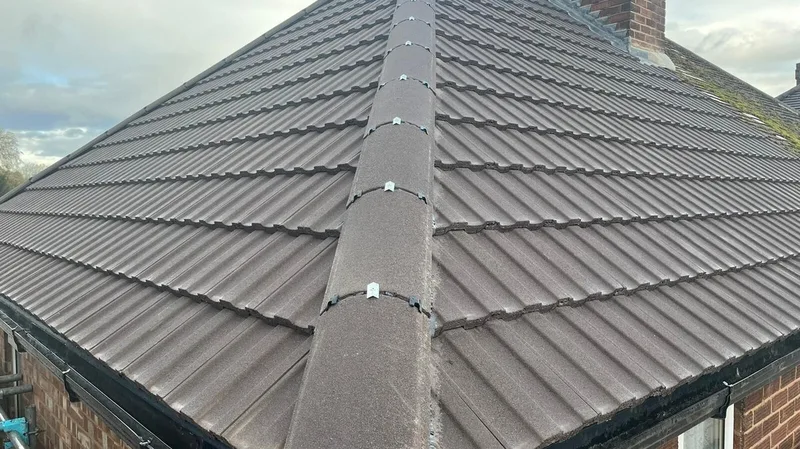 Concrete tile hip roof by a roofer in our network