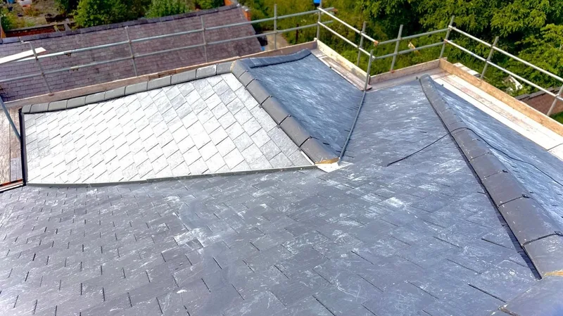 Slate roof with hip and valley by a roofer in our network